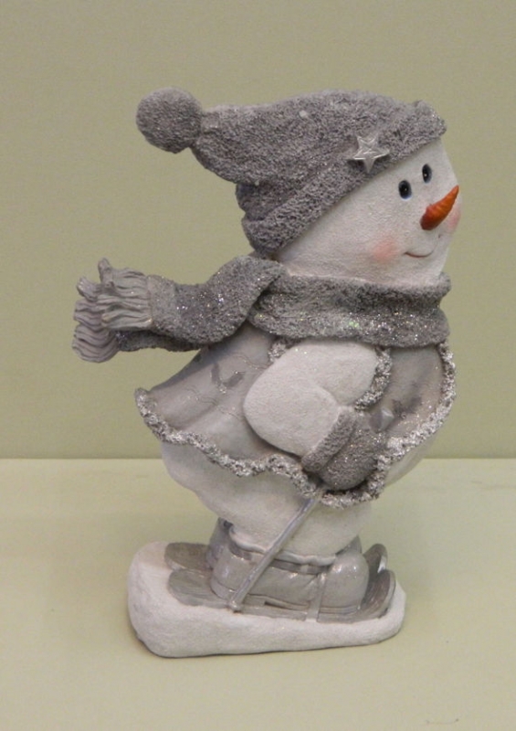 Schneemann auf Ski